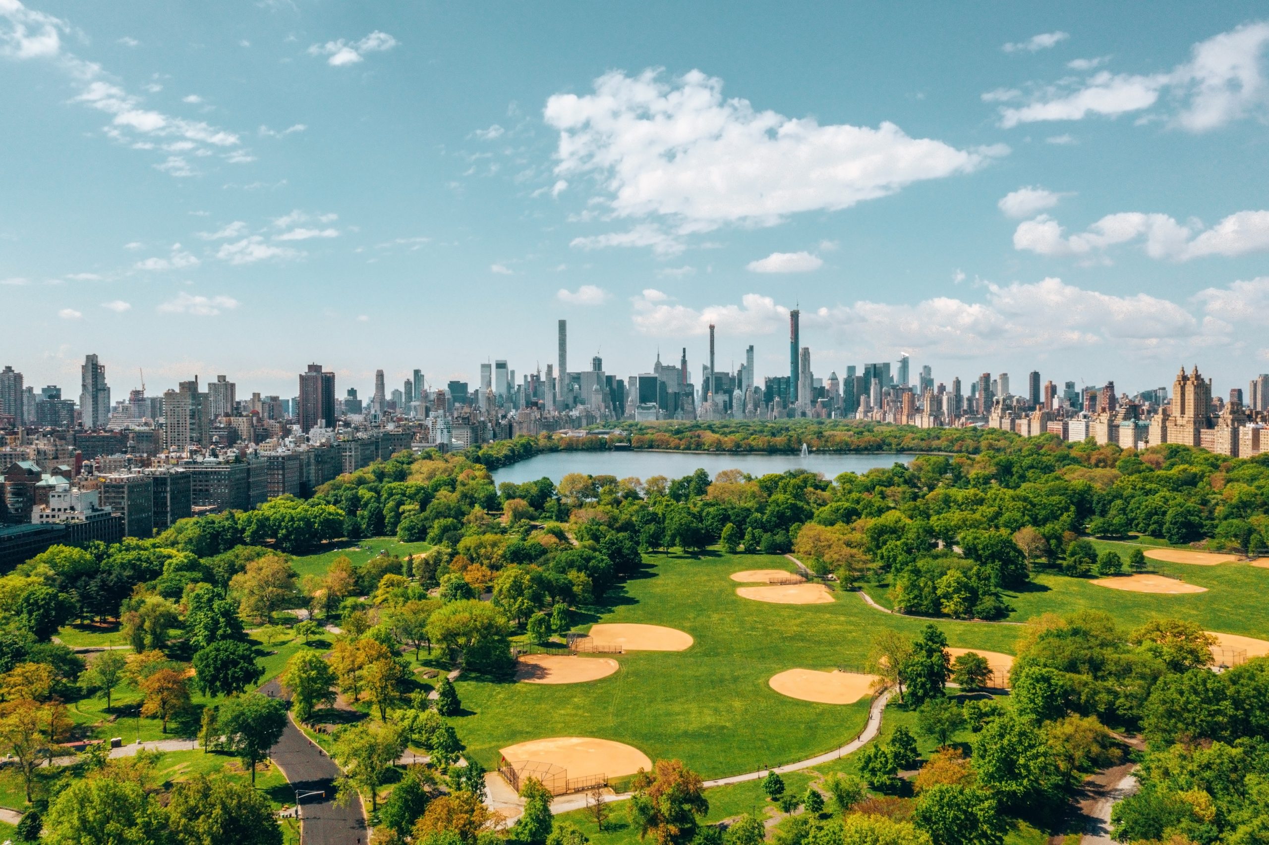 Green Spaces and Climate Resilience: British New Towns vs Indian Megacities
